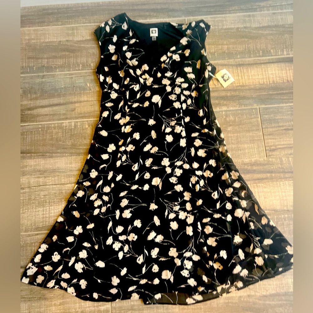 Anne Klein new dress. Size 12 -Beautiful material black with beige flowers.